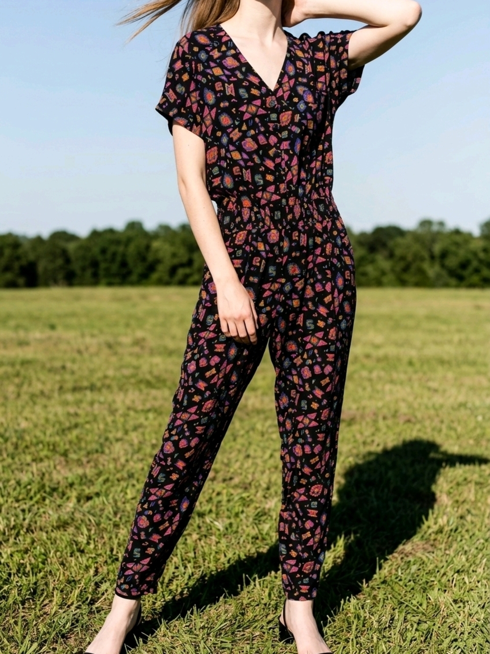Aprico Black V‑Neck Floral Print Jumpsuit